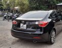 Kia K3    2014 - Cần bán Kia K3 năm sản xuất 2014, màu đen