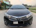 Toyota Camry  1.8GAT 2015 - Cần bán gấp Toyota Camry 1.8GAT đời 2015, màu đen