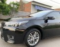 Toyota Camry  1.8GAT 2015 - Cần bán gấp Toyota Camry 1.8GAT đời 2015, màu đen