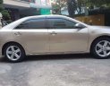 Toyota Camry   2014 - Bán Toyota Camry đời 2014, màu vàng, giá 850tr