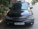 Ford Laser   2004 - Bán Ford Laser sản xuất 2004, màu đen, nhập khẩu  