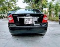 Ford Focus 2005 - Cần bán xe Ford Focus sản xuất năm 2005, màu đen xe nguyên bản