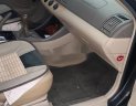 Toyota Camry   2004 - Cần bán lại xe Toyota Camry sản xuất 2004, màu đen