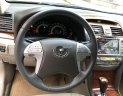 Toyota Camry 2007 - Cần bán Toyota Camry 2.4 G AT sản xuất năm 2007, màu đen số tự động giá tốt