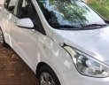 Hyundai Grand i10 2015 - Cần bán gấp Hyundai Grand i10 đời 2015, màu trắng, xe nhập xe gia đình