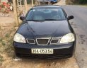 Daewoo Lacetti 2004 - Cần bán lại xe Daewoo Lacetti sản xuất năm 2004, màu đen