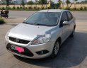 Ford Focus 2009 - Cần bán gấp Ford Focus 2009, màu bạc số sàn, 215tr