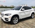 BMW X6 xDrive50i 2009 - Bán xe BMW X6 xDrive50i đời 2009, màu trắng, xe nhập