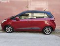 Hyundai Grand i10 2014 - Cần bán gấp Hyundai Grand i10 năm sản xuất 2014, màu đỏ, nhập khẩu như mới