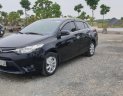 Toyota Vios 1.5E 2014 - Cần bán lại Toyota Vios E năm sản xuất 2014, màu đen, số sàn