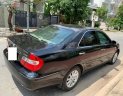 Toyota Camry 3.0V 2004 - Bán Toyota Camry 3.0V đời 2004, màu đen số tự động