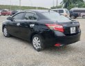 Toyota Vios 1.5E 2014 - Cần bán lại Toyota Vios E năm sản xuất 2014, màu đen, số sàn