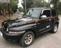 Ssangyong Korando 2004 - Bán xe Ssangyong Korando TX5 AT 4WD năm 2004, màu đen, xe nhập