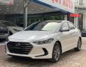 Hyundai Elantra 1.6 AT 2016 - Cần bán gấp Hyundai Elantra 1.6 AT 2016, màu trắng xe nguyên bản