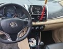 Toyota Vios 1.5E 2014 - Cần bán lại Toyota Vios E năm sản xuất 2014, màu đen, số sàn