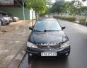 Ford Laser 2003 - Bán Ford Laser 1.8 AT 2003, màu đen chính chủ, 190 triệu