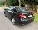 Toyota Corolla 2010 - Cần bán gấp Toyota Corolla XLi 1.6 năm 2010, màu đen, xe nhập