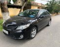 Toyota Corolla 2010 - Cần bán gấp Toyota Corolla XLi 1.6 năm 2010, màu đen, xe nhập