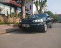 Ford Laser   2004 - Bán xe cũ Ford Laser 2004, màu đen, 176 triệu