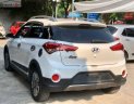 Hyundai i20 Active   1.4 AT 2015 - Cần bán gấp Hyundai i20 Active 1.4 AT năm sản xuất 2015, màu trắng, nhập khẩu nguyên chiếc