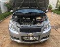 Chevrolet Aveo 2015 - Cần bán gấp Chevrolet Aveo sản xuất 2015, màu bạc