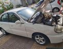 Daewoo Lanos 2001 - Cần bán lại xe Daewoo Lanos MT sản xuất 2001, màu trắng số sàn