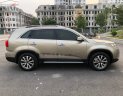 Kia Sorento DATH 2.2L 2WD 2014 - Cần bán lại xe Kia Sorento DATH 2.2L 2WD đời 2014, màu vàng chính chủ, 725tr