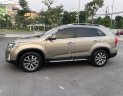 Kia Sorento DATH 2.2L 2WD 2014 - Cần bán lại xe Kia Sorento DATH 2.2L 2WD đời 2014, màu vàng chính chủ, 725tr