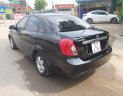 Daewoo Lacetti 2009 - Bán Daewoo Lacetti EX sản xuất năm 2009, màu đen số sàn giá cạnh tranh