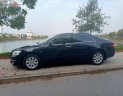 Toyota Camry 2.4G 2007 - Bán Toyota Camry 2.4G sản xuất năm 2007, màu đen