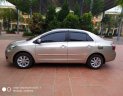 Toyota Vios 1.5E 2014 - Tôi cần bán chiếc xe ô tô Toyota Vios 1.5E màu ghi vàng SX 2014