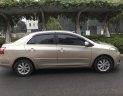 Toyota Vios 1.5E 2014 - Tôi cần bán chiếc xe ô tô Toyota Vios 1.5E màu ghi vàng SX 2014