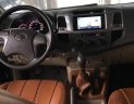 Toyota Hilux 2012 - Cần bán lại xe Toyota Hilux MT đời 2012, màu đen xe gia đình