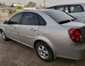 Daewoo Lacetti   2010 - Bán ô tô Daewoo Lacetti sản xuất năm 2010, màu bạc xe gia đình, giá tốt