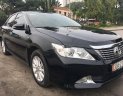 Toyota Camry   2014 - Bán Toyota Camry 2.0E đời 2014, màu đen, biển Hà Nội