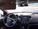 Hyundai Grand i10     2014 - Cần bán Hyundai Grand i10 sản xuất 2014, màu trắng, xe nhập chính chủ, giá tốt