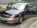 Daewoo Magnus   2004 - Cần bán Daewoo Magnus sản xuất 2004, màu đen, nhập khẩu nguyên chiếc 