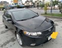 Kia Forte 2009 - Cần bán lại xe Kia Forte AT đời 2009, màu đen, xe nhập, giá chỉ 320 triệu