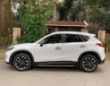 Mazda CX 5 2017 - Cần bán gấp Mazda CX 5 sản xuất 2017, màu trắng như mới, 765tr