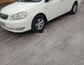 Toyota Corolla 2002 - Cần bán lại xe Toyota Corolla 1.3 sản xuất năm 2002, màu trắng xe gia đình