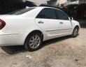 Toyota Camry 2004 - Cần bán xe Toyota Camry AT đời 2004, màu trắng, giá chỉ 275 triệu