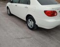 Toyota Corolla 2002 - Cần bán lại xe Toyota Corolla 1.3 sản xuất năm 2002, màu trắng xe gia đình