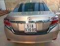 Toyota Vios   2014 - Bán Toyota Vios sản xuất 2014, màu vàng, xe gia đình