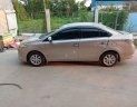 Toyota Vios   2014 - Bán Toyota Vios sản xuất 2014, màu vàng, xe gia đình