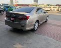 Toyota Camry 2013 - Cần bán Toyota Camry đời 2013, màu vàng