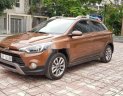 Hyundai i20 Active  1.4 AT 2015 - Cần bán gấp Hyundai i20 Active 1.4 AT 2015, màu vàng đồng, xe nhập, giá 485tr