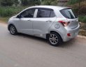 Hyundai Grand i10 2015 - Cần bán lại xe Hyundai Grand i10 2015, màu bạc, xe nhập chính chủ