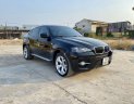 BMW X6   xDrive 35i   2010 - Bán BMW X6 xDrive 35i năm 2010, màu đen, nhập khẩu, 720tr