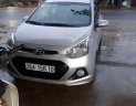 Hyundai Grand i10 2015 - Cần bán lại xe Hyundai Grand i10 2015, màu bạc, xe nhập chính chủ