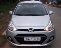 Hyundai Grand i10 2015 - Cần bán lại xe Hyundai Grand i10 2015, màu bạc, xe nhập chính chủ